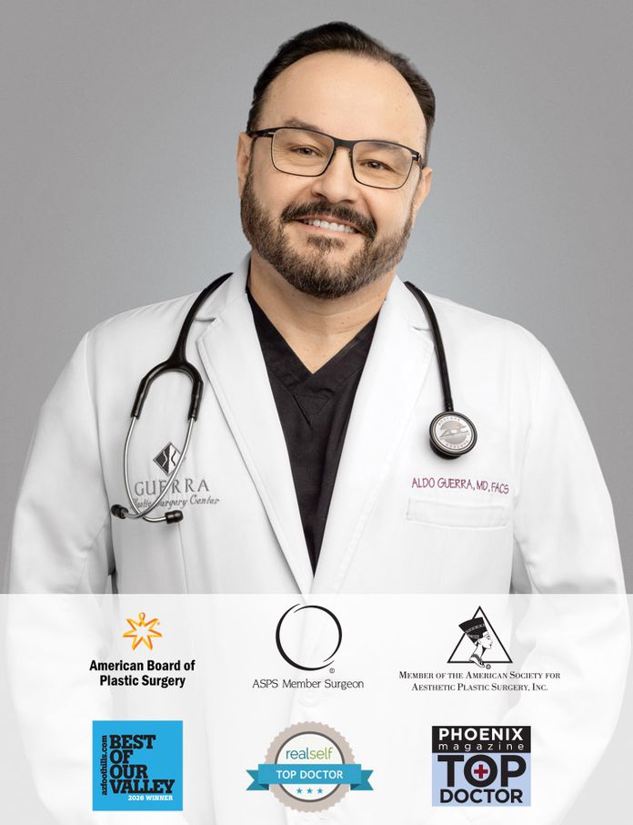 Dr. Aldo Guerra in labcoat with award logos