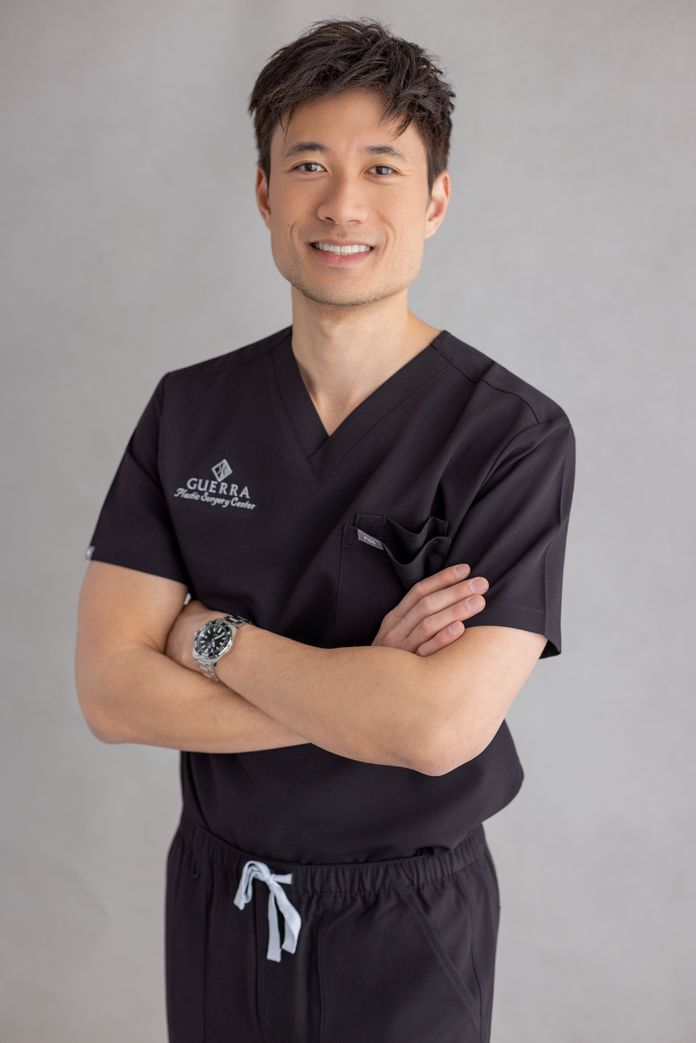 Dr. Jonathan Dang in black scrubs